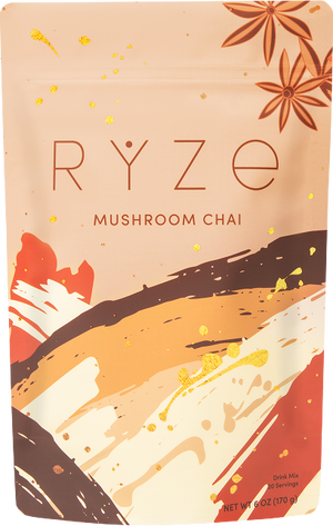 RYZE Mushroom Chai bag product view: blush pink and rose tones with star anise botanical brushstroke design, on...